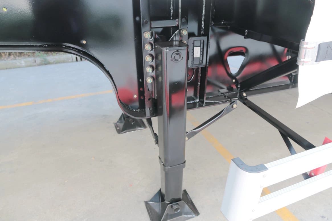 Detail of JOST brand landing gear on Kales 13M Curtainsider semi-trailer.
