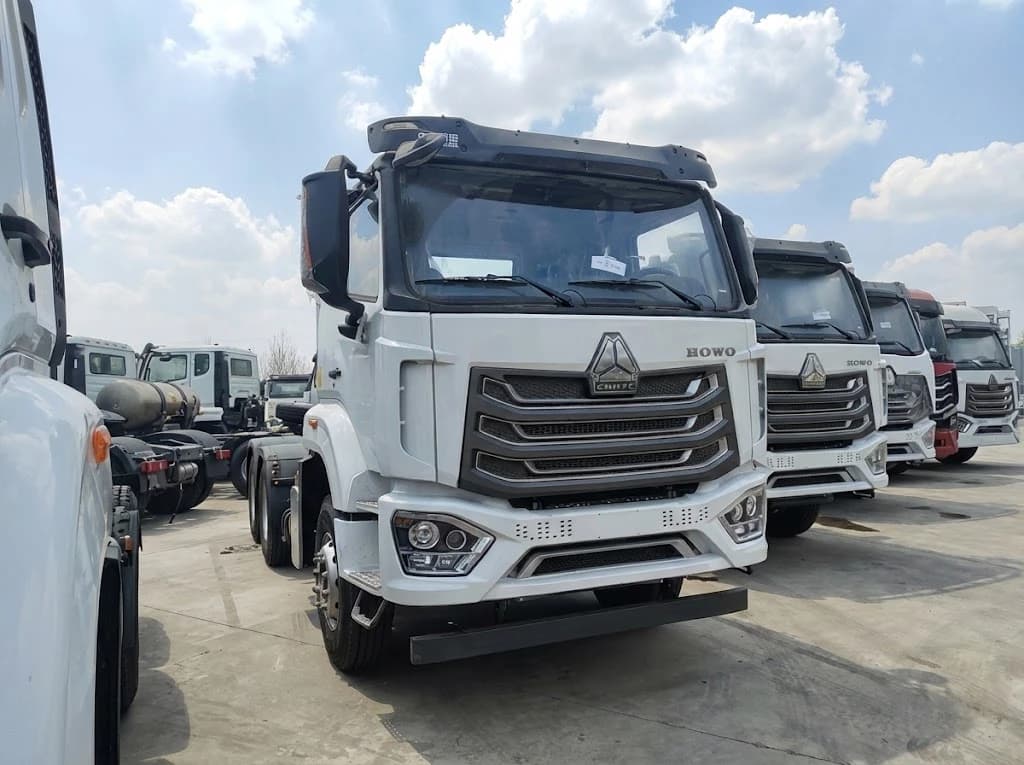 Batch of newly refurbished Sinotruk HOWO 371 tractor trucks ready for export.