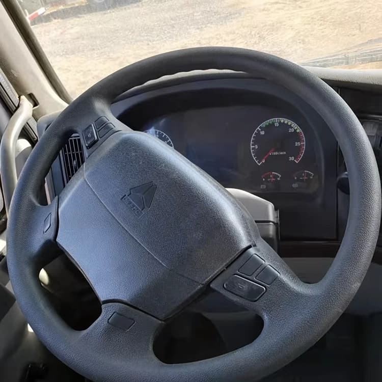 Refurbished steering wheel detail on Kales Vehicle HOWO truck, available in LHD or RHD. (