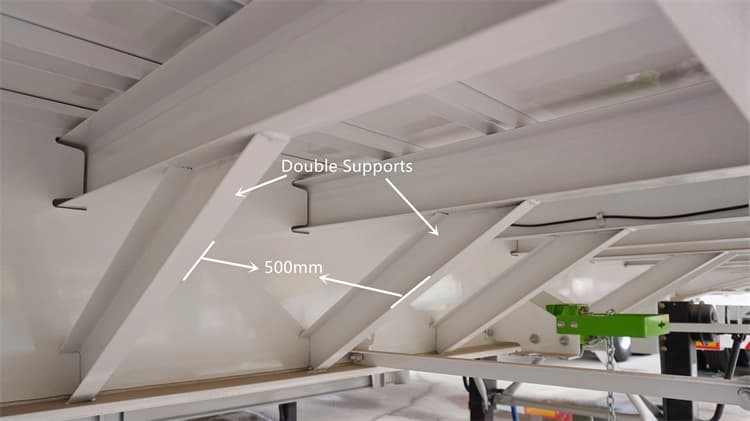 Kales 60-ton fence trailer chassis structure featuring 500mm main beam, high-density cross members, and diagonal bracing.