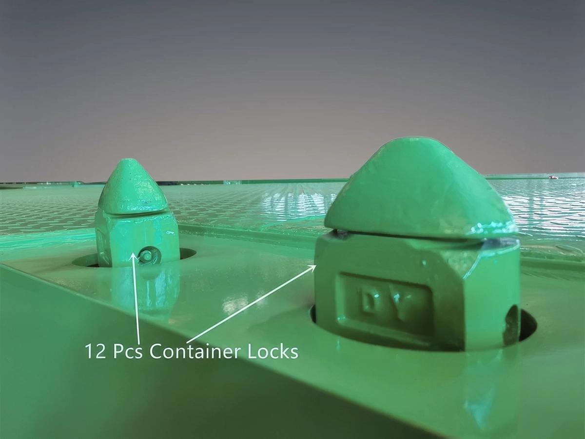 Detail of ISO container twist locks (12 sets) on Kales 40ft flatbed trailer for secure transport.