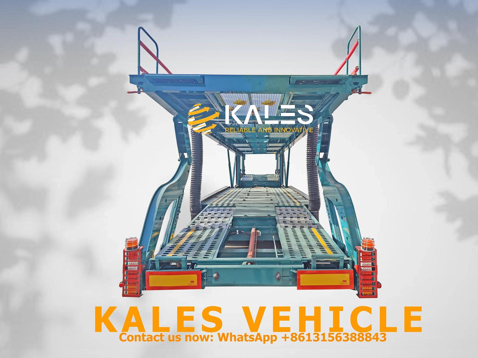 Rear LED tail lights and slide-out loading ladder detail on Kales car carrier for safe operation.
