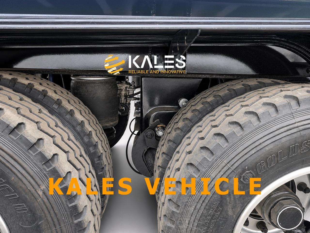 Front pneumatic air suspension lift axles on a Kales 5 axle dumper