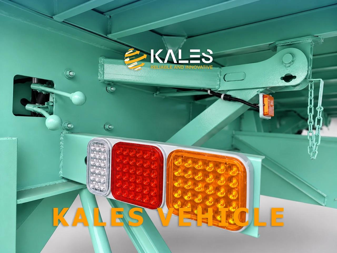 Close-up of manual hydraulic control valve and patented co-axial tipping pivot saddles on Kales chassis