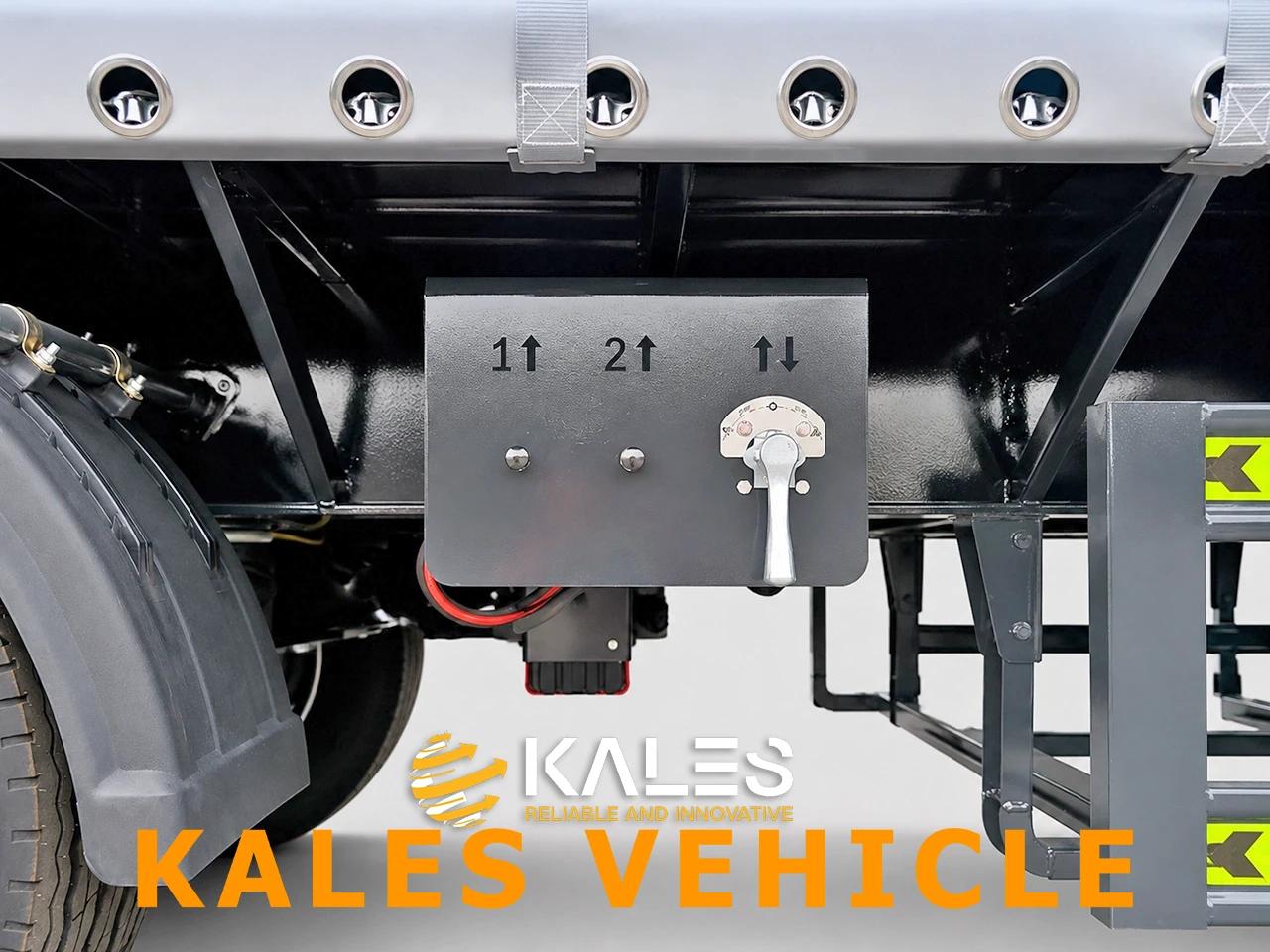 Close-up of Kales front lift axle pneumatic actuator and under-chassis beam-type spare tire carrier
