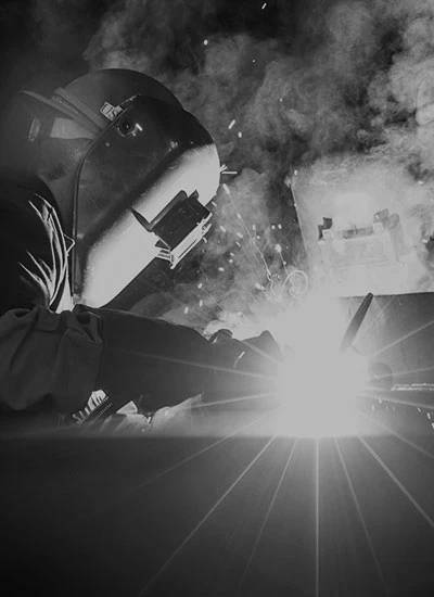 Welding is being done by skilled workers at the kales truck production plant.