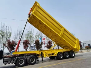 Kales rear dump trailer with front telescopic cylinder extended