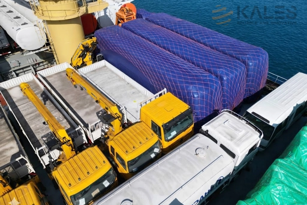 Bulk cargo transport of stacked Kales semi trailers with wax spraying protection against seawater corrosion.