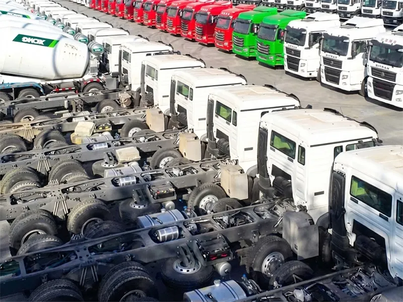 Large inventory of heavy-duty commercial truck chassis and tractor heads ready for export at Kales Vehicle factory yard