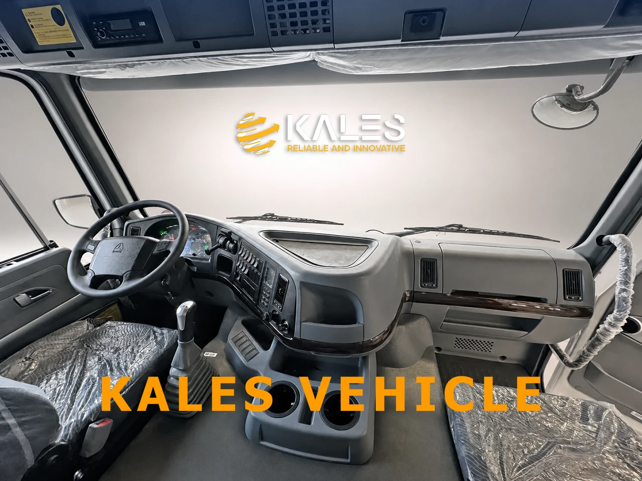 Kales refurbished cabin interior with clean dashboard and renewed sleeper berth on HOWO 371 truck.
