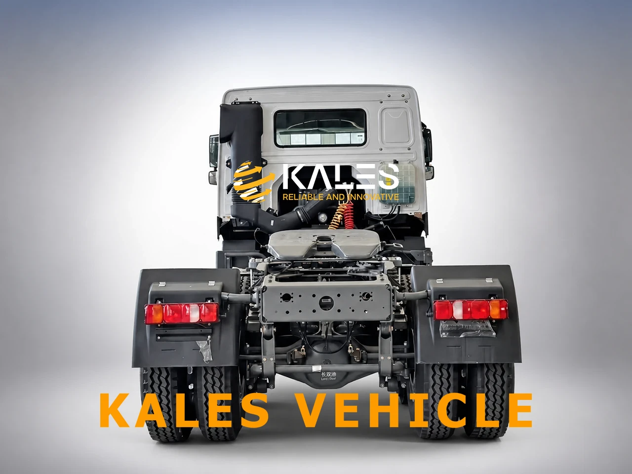 Rear view of Kales refurbished HOWO 6x4 tractor head highlighting fifth wheel and rear axles.
