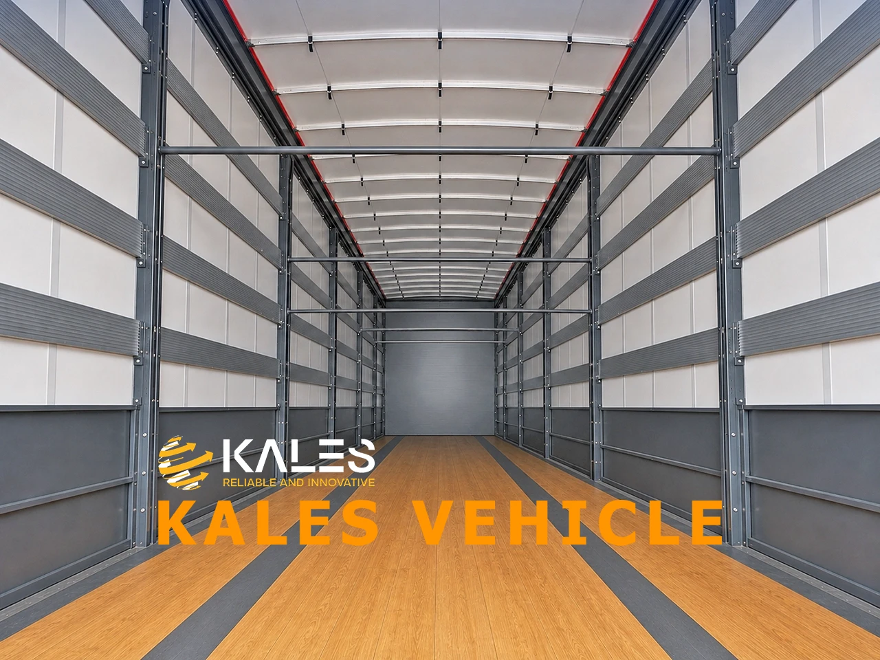 Interior view of Kales 120m³ curtain-side trailer showing 28mm anti-slip timber floor and 34 recessed cargo lashing rings