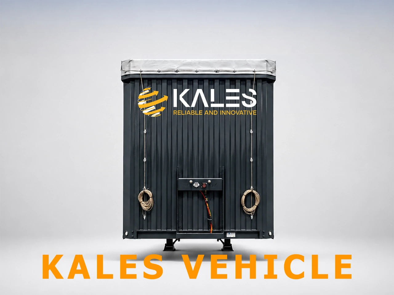 Front direct view of Kales 17.5m curtain trailer highlighting reinforced corrugated steel front bulkhead and air couplings