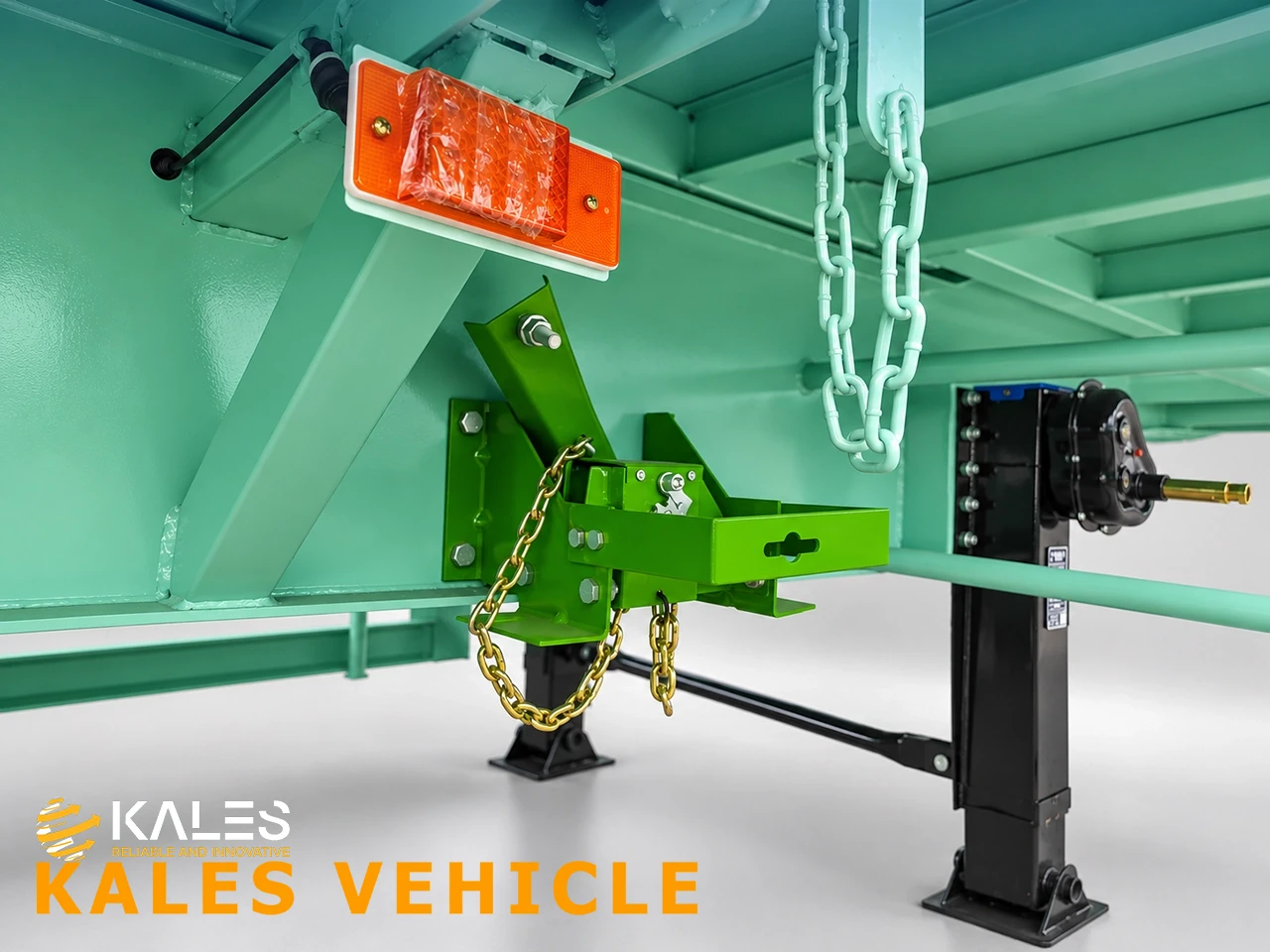 Under-chassis beam-type spare tire carrier with winch mechanism on Kales semi-trailer